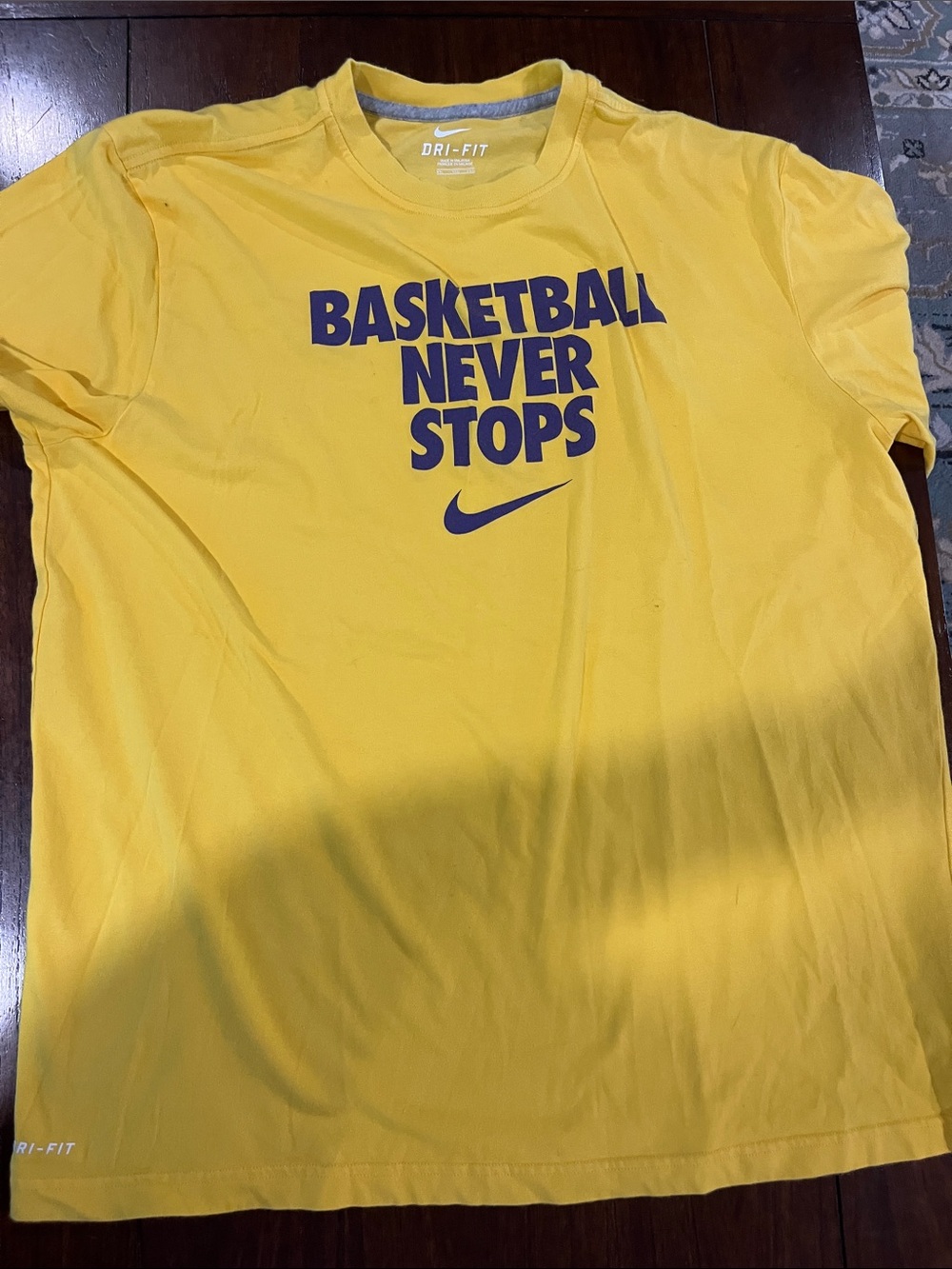 Nike Yellow Tee with Navy 'Basketball Never Stops' Graphic